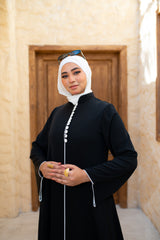 عباية بزراير